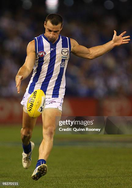 Brent Harvey of the Kangaroos kicks during the round three AFL match between the North Melbourne Kangaroos and the West Coast Eagles at Etihad...