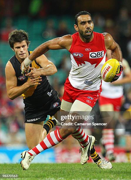 Adam Goodes of the Swans breaks through the defence during the round three AFL match between the Sydney Swans and the Richmond Tigers at Sydney...