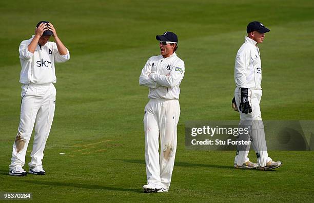 Warwickshire fielders Jonathan Trott Ian Bell and Tim Ambrose look on as Warwickshire struggle to take the 8th Yorkshire wicket during the 2nd day of...