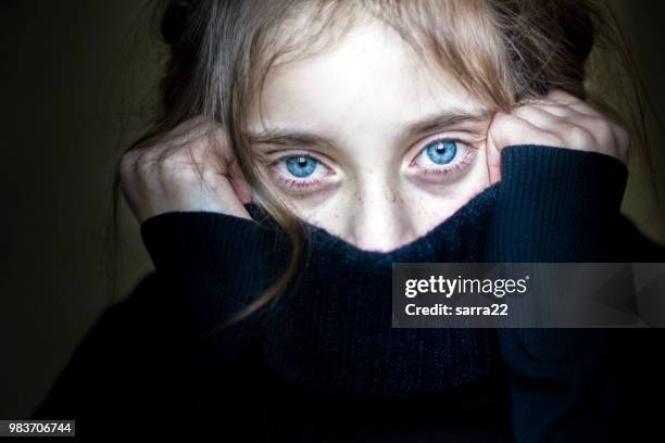 girl hiding her face. - shock imagens e fotografias de stock