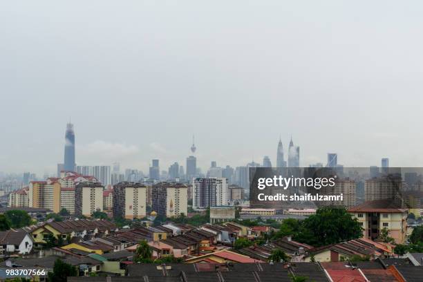 view of cloudy day over downtown kuala lumpur, capital city of malaysia. - shaifulzamri bildbanksfoton och bilder