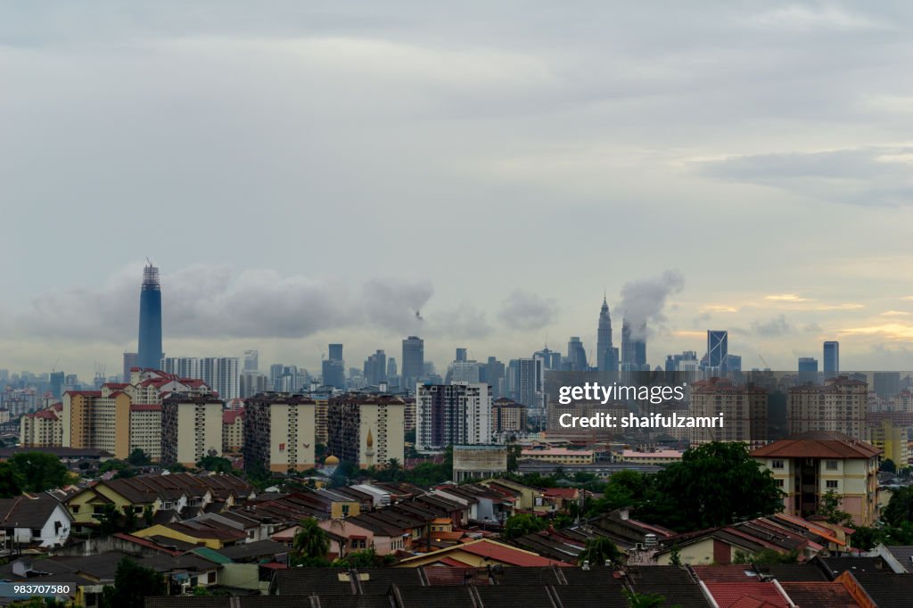 View of cloudy day over downtown Kuala Lumpur, capital city of Malaysia.