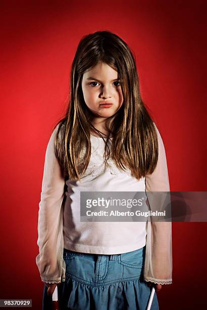 little girl frowns into the camera. - alberto guglielmi imagens e fotografias de stock