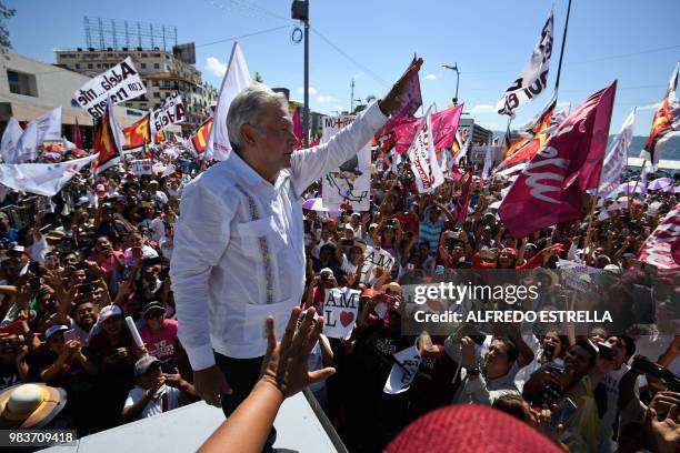 Mexico's presidential candidate for the MORENA party, Andres Manuel Lopez Obrador, greets supporters during a campaign rally in Acapulco, Guerrero...