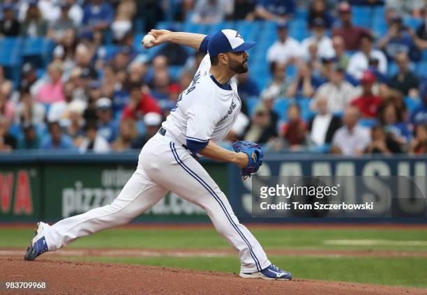 Jaime Garcia of the Toronto Blue Jays delivers a pitch in the first inning during MLB game action against the Atlanta Braves at Rogers Centre on June...