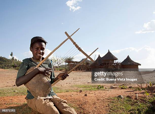 konso girl with self made harp - omo valley stock pictures, royalty-free photos & images