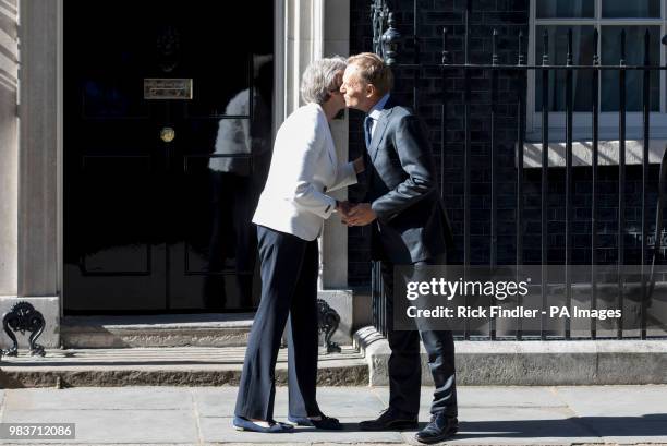 Prime Minister Theresa May greets President of the European Council Donald Tusk outside No 10 Downing Street, London, ahead of bilateral talks.