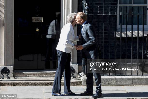 Prime Minister Theresa May greets President of the European Council Donald Tusk outside No 10 Downing Street, London, ahead of bilateral talks.