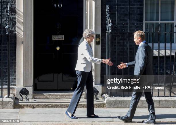 Prime Minister Theresa May greets President of the European Council Donald Tusk outside No 10 Downing Street, London, ahead of bilateral talks.