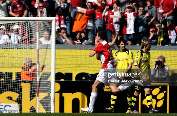 Adam Szalai of Mainz celebrates his team's first goal during the Bundesliga match between FSV Mainz 05 and Borussia Dortmund at the Bruchweg Stadium...