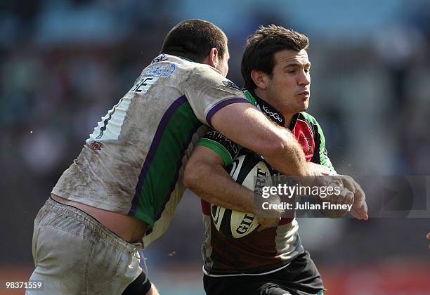 Danny Care of Quins is tackled by Mike MacDonald of Leeds during the Guinness Premiership match between Harlequins and Leeds Carnegie at The Stoop on...