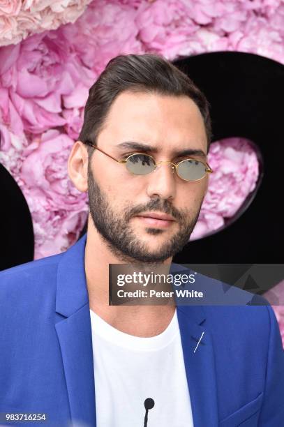 Guest attends the Dior Homme Menswear Spring/Summer 2019 show as part of Paris Fashion Week on June 23, 2018 in Paris, France.