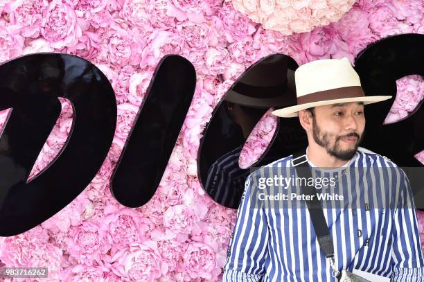 Guest attends the Dior Homme Menswear Spring/Summer 2019 show as part of Paris Fashion Week on June 23, 2018 in Paris, France.