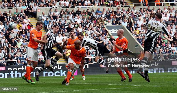 Andy Carroll heads the second goal during the Coca Cola Championship match between Newcastle United and Blackpool at St.James' Park on April 10, 2010...