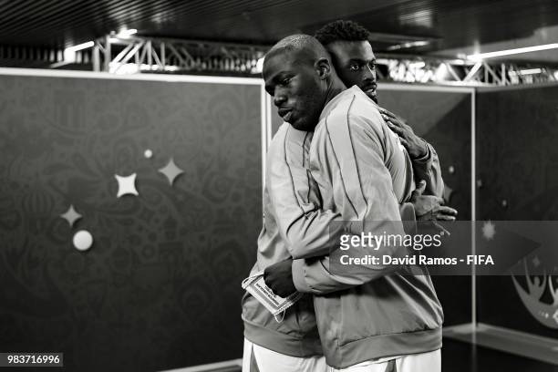 Kalidou Koulibaly of Senegal hugs his team mate Mbaye Niang in the tunnel prior to the 2018 FIFA World Cup Russia group H match between Japan and...