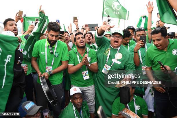 Saudi Arabia fans celebrate the team's win in the Russia 2018 World Cup Group A football match between Saudi Arabia and Egypt at the Volgograd Arena...