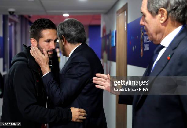 Vice president of Portugal footbal federadtion Humberto Coelho cheers Joao Moutinho prior to the 2018 FIFA World Cup Russia group B match between...