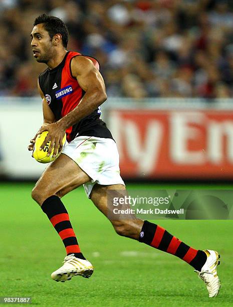 Nathan Lovett-Murray of the Bombers gathers the ball during the round three AFL match between the Carlton Blues and the Essendon Bombers at Melbourne...
