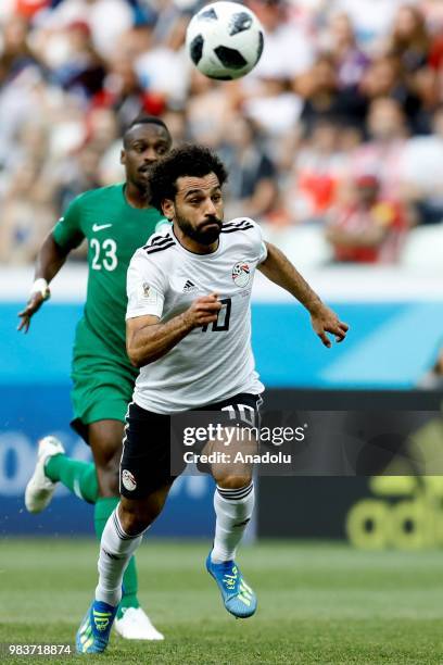 Mohamed Salah of Egypt in action against Motaz Hawsaw of Saudi Arabia during the 2018 FIFA World Cup Russia Group A match between Saudi Arabia and...