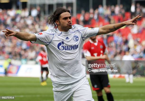 Edu of Schalke celebrates after scoring his team first goal during the Bundesliga match between Hannover 96 and FC Schalke 04 at AWD Arena on April...