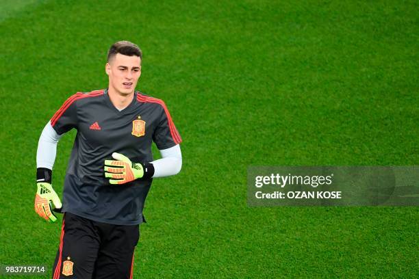 Spain's goalkeeper Kepa Arrizabalaga warms up before the Russia 2018 World Cup Group B football match between Spain and Morocco at the Kaliningrad...