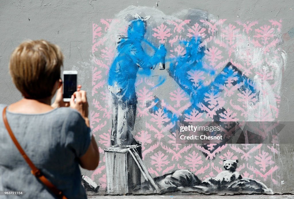 British Graffiti Artist Banksy Puts Up  New Works In Paris