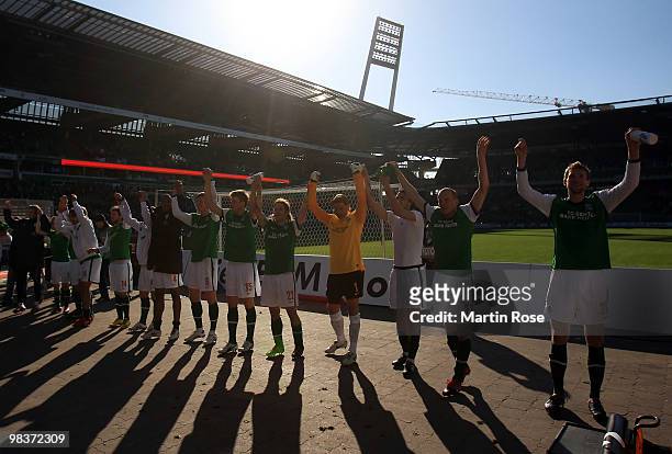 The team of Bremen celebrate after the Bundesliga match between Werder Bremen and SC Freiburg at the Weser Stadium on April 10, 2010 in Bremen,...