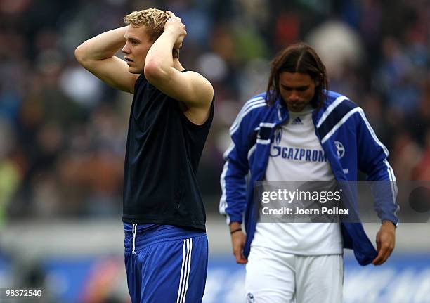 Manuel Neuer and Edu of Schalke look dejected after the Bundesliga match between Hannover 96 and FC Schalke 04 at AWD Arena on 10 April, 2010 in...