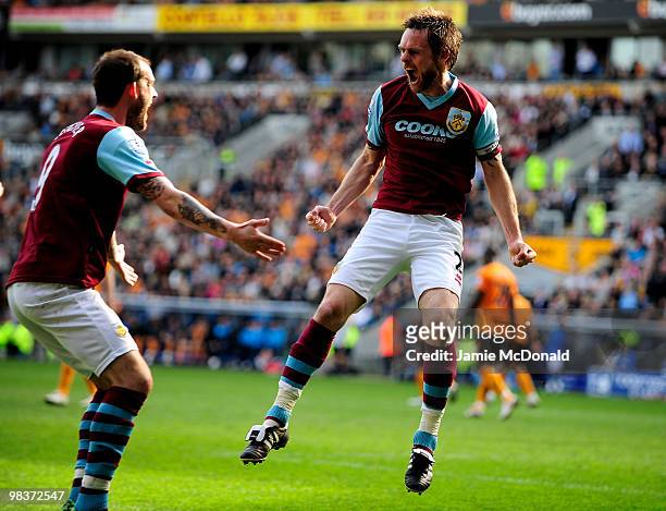 Graham Alexander of Burnley celebrates scoring his team's third goal from a penalty during the Barclays Premier League match between Hull City and...