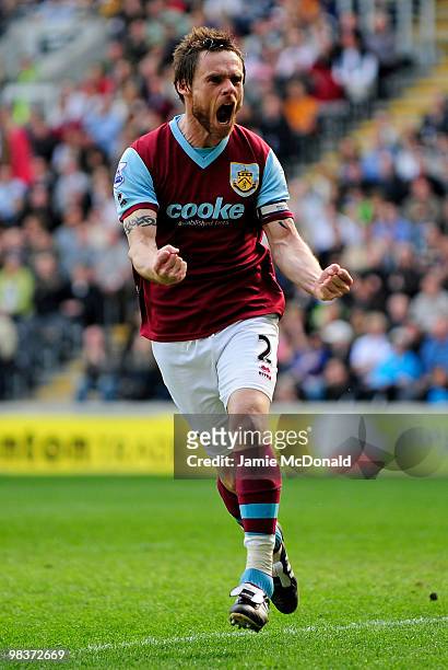 Graham Alexander of Burnley celebrates scoring his team's third goal from a penalty during the Barclays Premier League match between Hull City and...