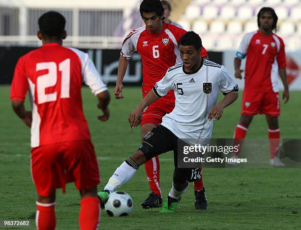 Elias Kachunga of Germany battles for the ball with Mohamed Salem of UAE during the U18 International Friendly match between United Arab Emirates and...