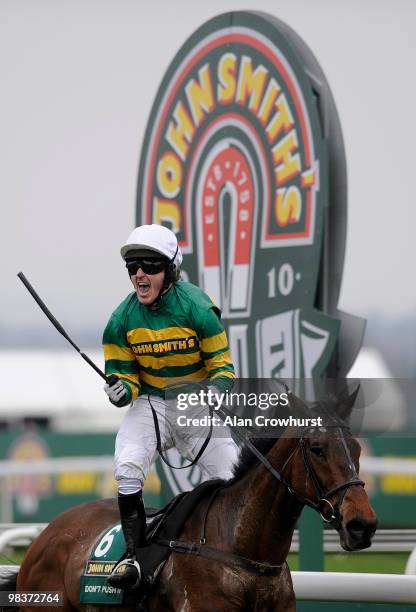 Don't Push It and Tony McCoy win the John Smith's Grand National Steeple Chase at Aintree racecourse on April 10, 2010 in Liverpool, England.