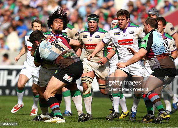 Alfie To'oala of Leeds is tackled by Nick Easter of Harlequins during the Guinness Premiership match between Harlequins and Leeds Carnegie at The...