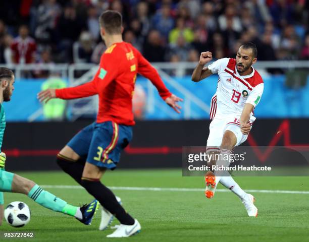 Khalid Boutaib of Morocco scores his team's first goal during the 2018 FIFA World Cup Russia group B match between Spain and Morocco at Kaliningrad...