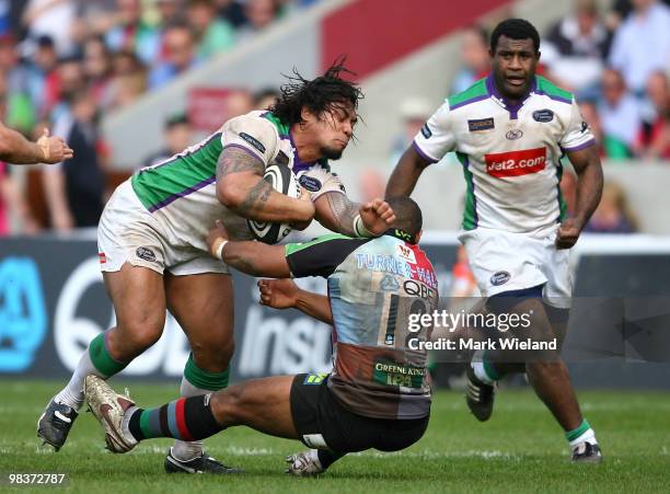 Alfie To'oala of Leeds is tackled by Jordan Turner-Hall of Harlequins during the Guinness Premiership match between Harlequins and Leeds Carnegie at...