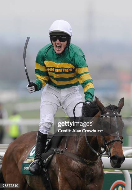 Don't Push It and Tony McCoy win the John Smith's Grand National Steeple Chase at Aintree racecourse on April 10, 2010 in Liverpool, England.