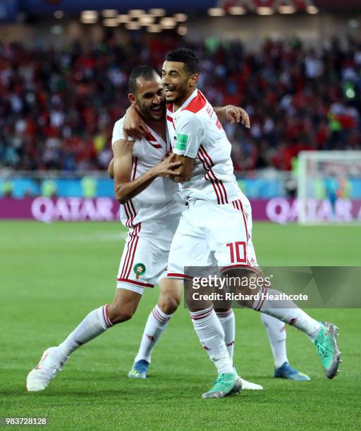 Khalid Boutaib of Morocco celebrates after scoring his team's first goal with teammate Younes Belhanda during the 2018 FIFA World Cup Russia group B...