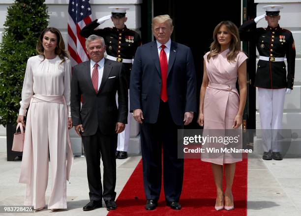 President Donald Trump and first lady Melania Trump welcome King Abdullah of Jordan and Queen Rania to the White House June 25, 2018 in Washington,...