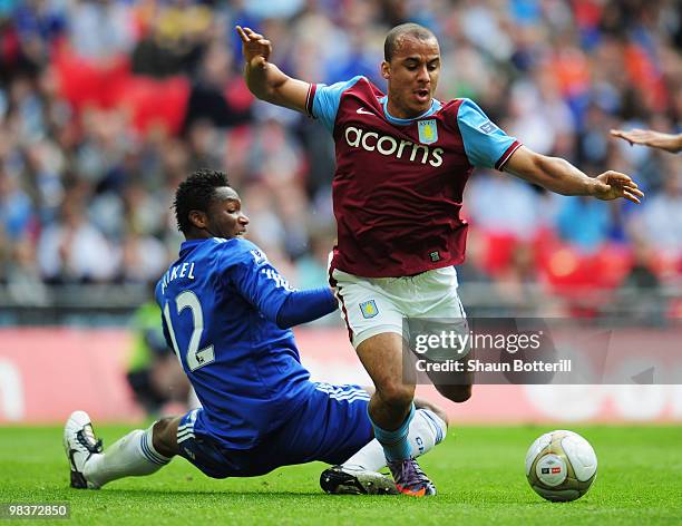 Gabriel Agbonlahor of Aston Villa is tackled by Jon Obi Mikel of Chelsea during the FA Cup sponsored by E.ON Semi Final match between Aston Villa and...