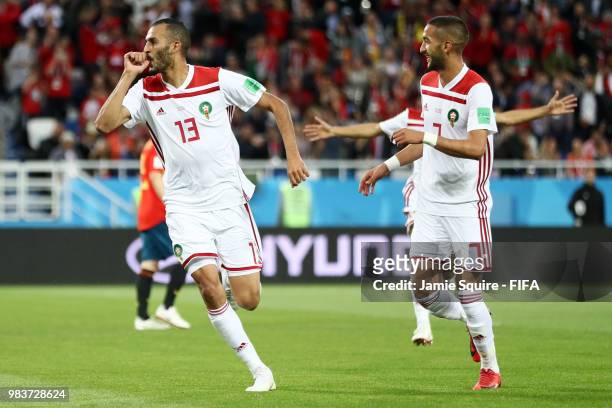 Khalid Boutaib of Morocco celebrates after scoring his team's first goal during the 2018 FIFA World Cup Russia group B match between Spain and...