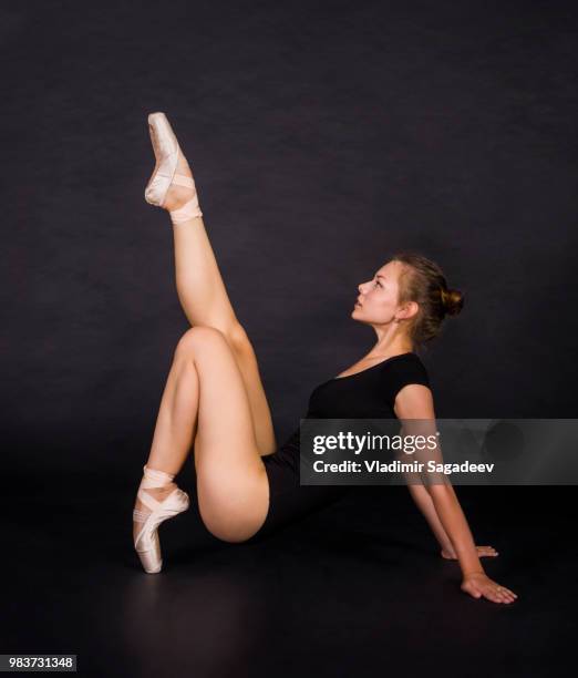 young,smiling girl dancing the ballet. studio shot - dancing studio shot stock pictures, royalty-free photos & images