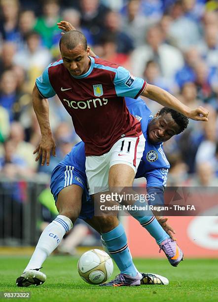 Gabriel Agbonlahor of Aston Villa is tackled by Jon Obi Mikel of Chelsea during the FA Cup sponsored by E.ON Semi Final match between Aston Villa and...