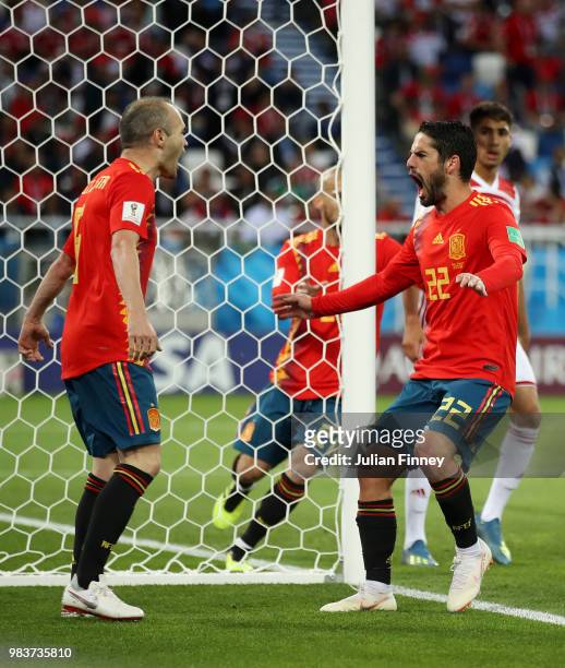 Isco celebrates with David Silva after scoring his sides opening goal to make the score 1-1 during the 2018 FIFA World Cup Russia group B match...
