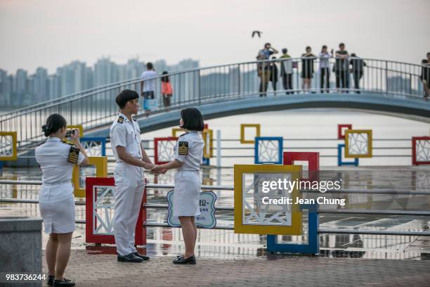 Visitors pass time near the "Green Beach" on Wolmido Island where the Operation Chromite by the U.S. Military was carried out on Sept. 15th on June...