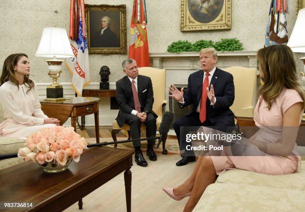 President Donald Trump and first lady Melania Trump meet with King Abdullah II and Queen Rania of Jordan in the Oval Office of the White House on...