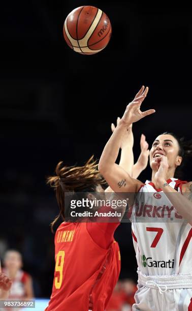 Melike Bakircioglu of Turkey in action against Meng Li of China during the friendly women's basketball match between Turkey and China at Sinan Erdem...