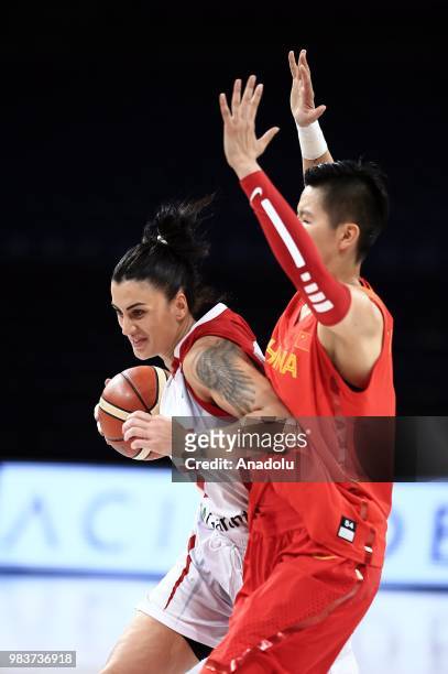 Melike Bakircioglu of Turkey in action against Si-Jing Huang of China during the friendly women's basketball match between Turkey and China at Sinan...
