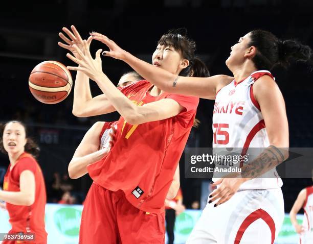 Tilbe Senyurek of Turkey in action against Xu Han of China during the friendly women's basketball match between Turkey and China at Sinan Erdem Dome...