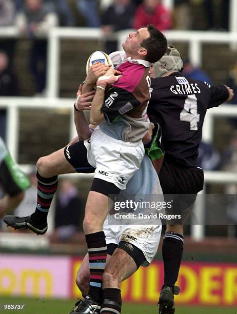 Ryan O''Neill, the Harlequins fullback catches the ball as Stuart Grimes of Newcastle challenges in the Newcastle v Harlequins European Shield match...