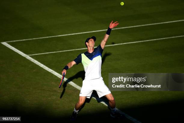 Andy Murray of Great Britain serves during his mens singles match against Stan Wawrinka of Switzerland during Day Four of the Nature Valley...